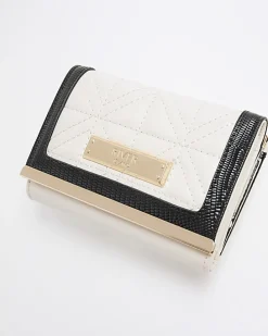 Cream quilted clip top purse