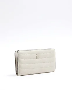 Cream quilted foldout purse
