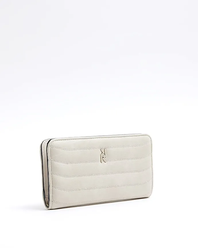 Cream quilted foldout purse