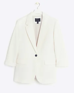 Cream rolled sleeve relaxed blazer