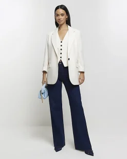 Cream rolled sleeve relaxed blazer