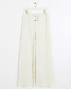 Cream textured wide leg trousers