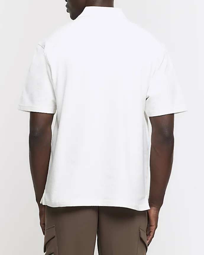Ecru regular fit textured half zip polo
