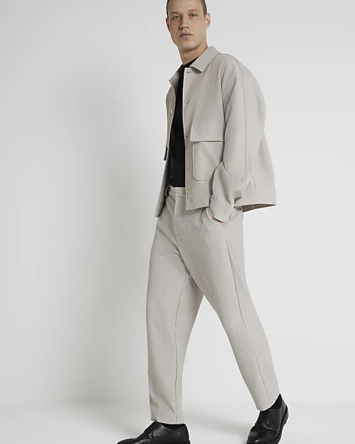 Ecru tapered fit plisse smart trousers
