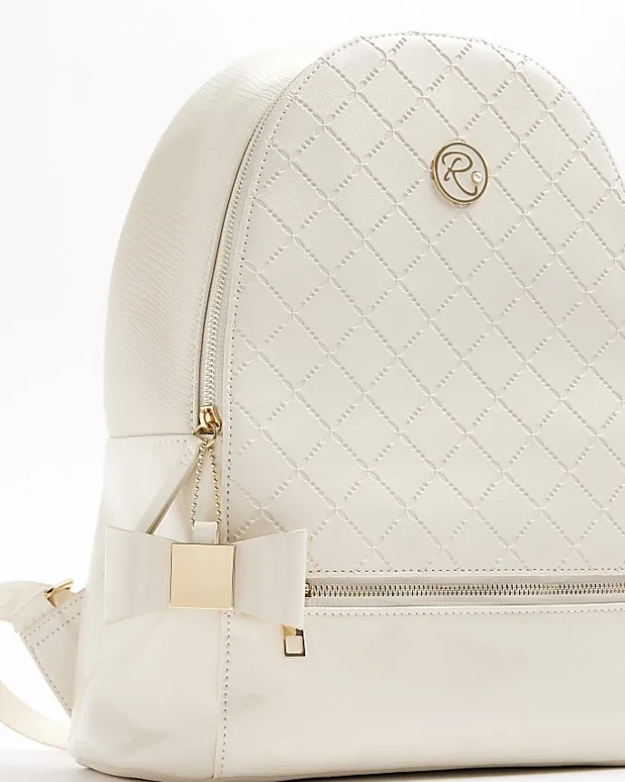 Girls cream bow quilted backpack set