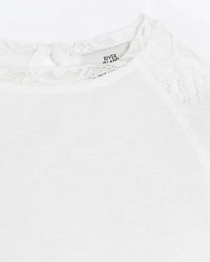 Girls cream lace detail long sleeve top