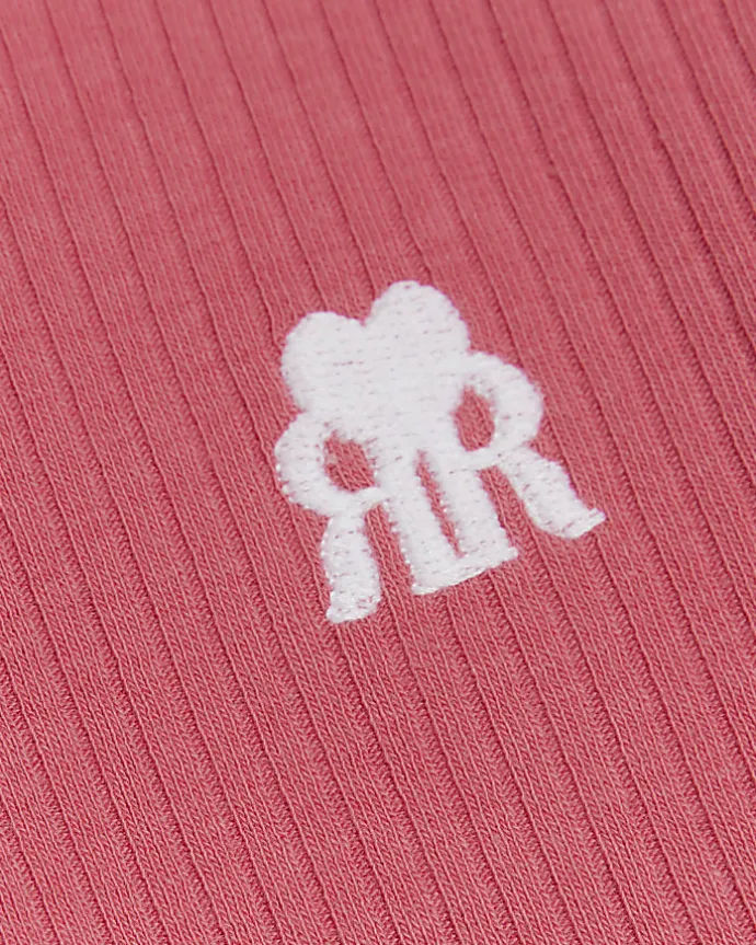 Girls pink long sleeve lettuce hem rib top