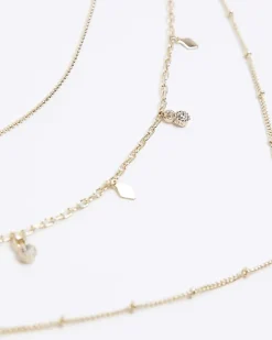 Gold charm multirow necklace