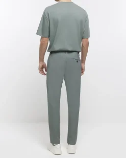 Green tapered fit smart trousers