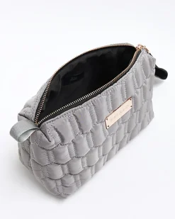 Grey quilted makeup bag