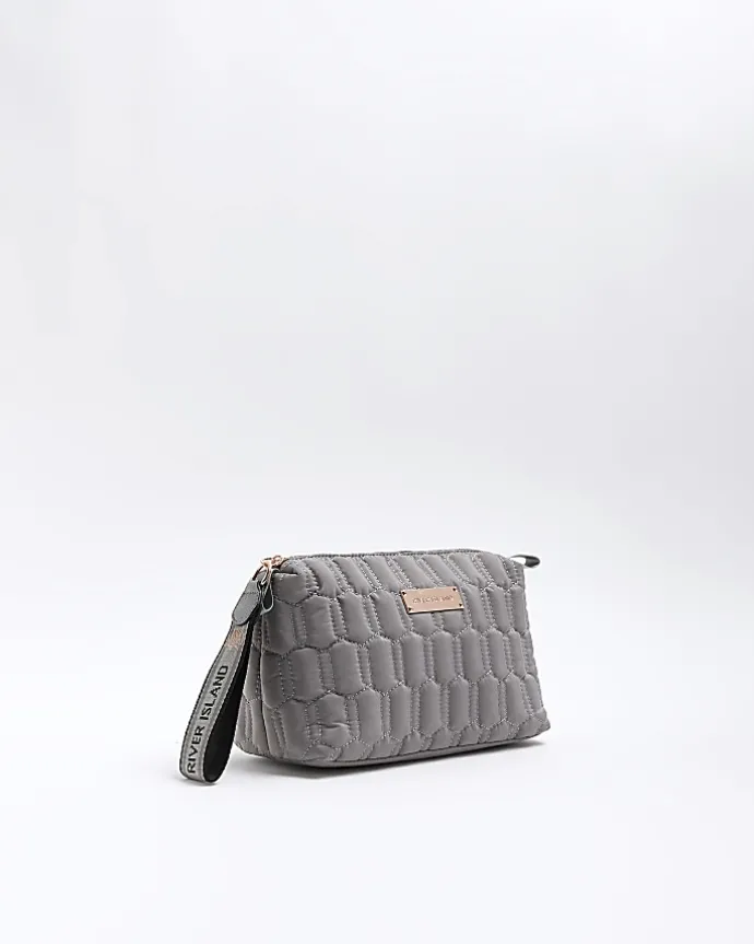 Grey quilted makeup bag