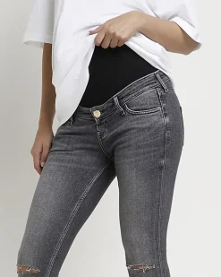 Grey ripped mid rise maternity skinny jeans