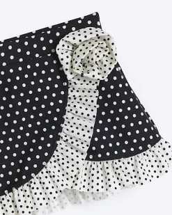 Mini girls black polka dot swim skirt