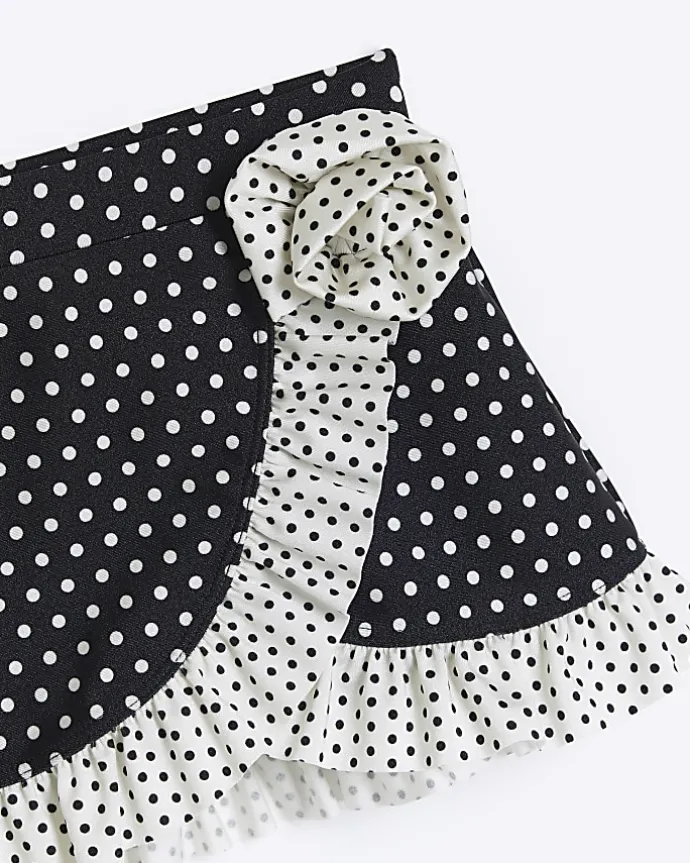 Mini girls black polka dot swim skirt