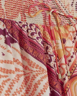 Orange floral wide leg trousers