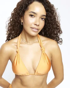 Orange low rise knot bikini bottoms