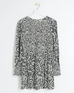 Petite black floral shirred swing mini dress