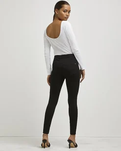 Petite black Molly mid rise skinny jeans