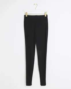 Petite black zip hem leggings