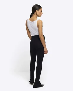 Petite black zip hem leggings