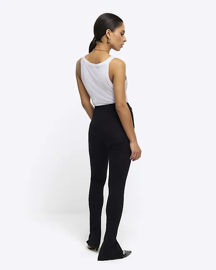 Petite black zip hem leggings