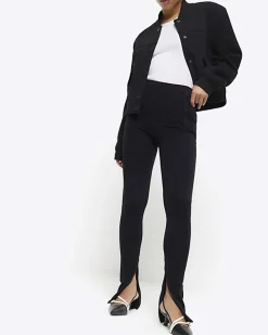 Petite black zip hem leggings