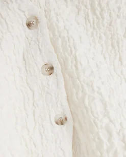 Petite cream textured long sleeve shirt