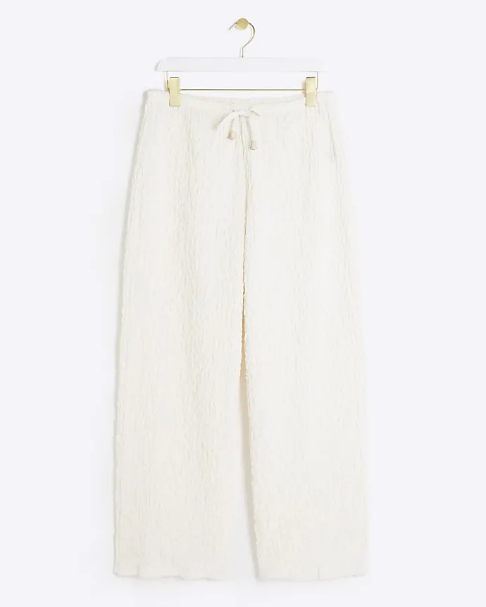 Petite cream textured wide leg trousers