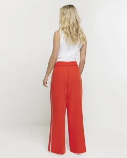 Petite red side stripe wide leg trousers