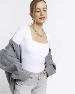 Petite white long sleeve bodysuit