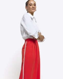 Red side stripe wide leg trousers