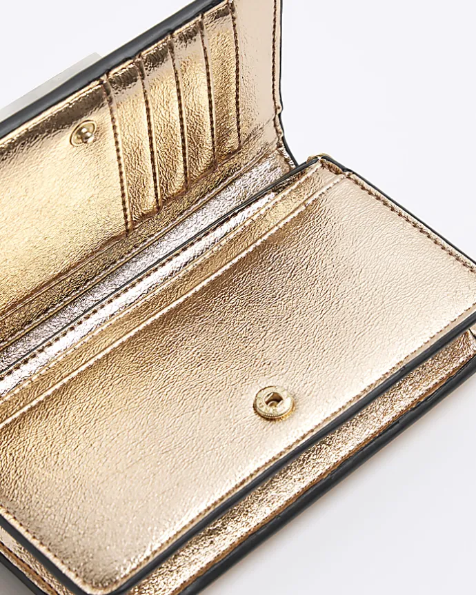 Rose gold quilted cross body purse