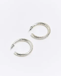 Silver textured hoop earrings