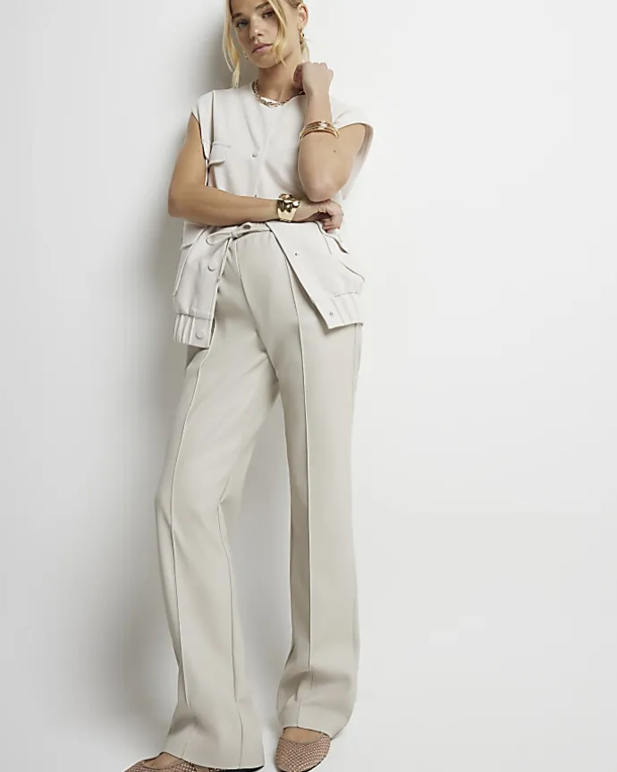 Stone faux leather wide leg trousers