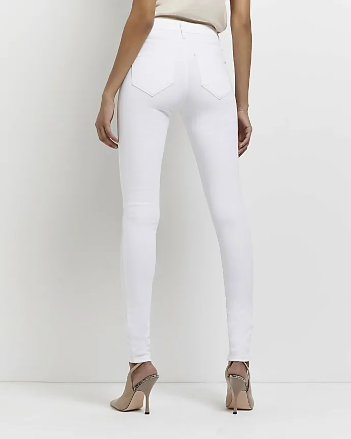 Tall white molly mid rise super skinny jeans