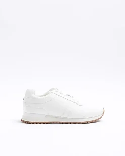 White embossed trainers